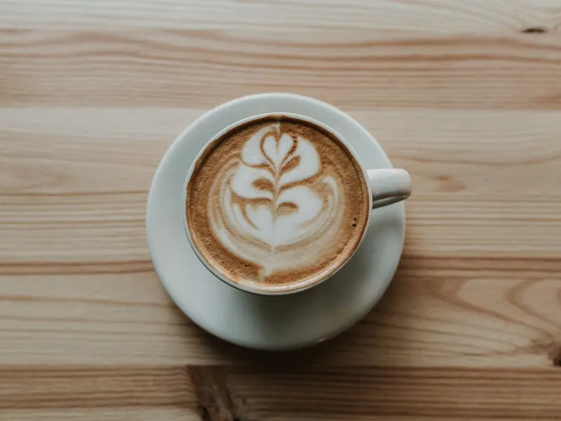 A flat white on a marble counter