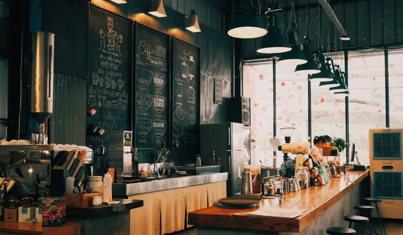 The corner table, most mornings — Qahwa & Co